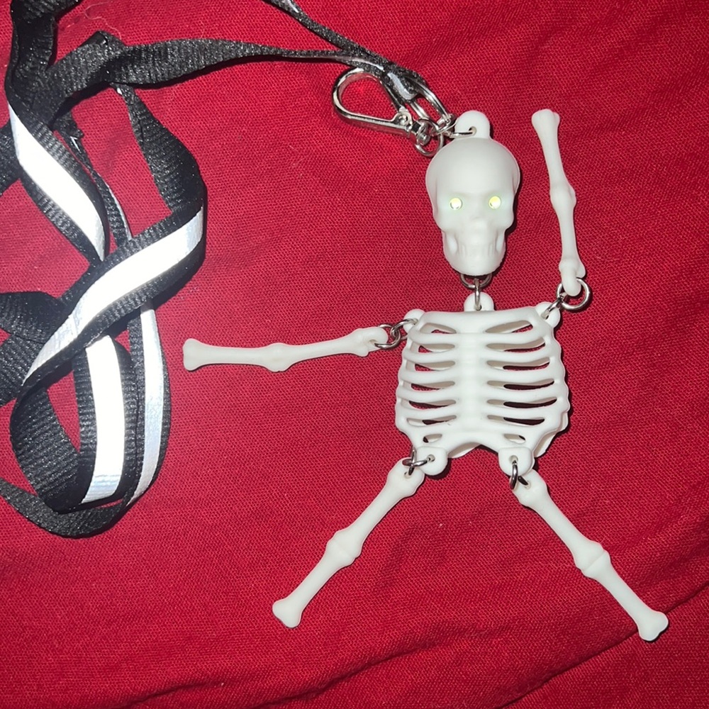 Glow in the dark skeleton hand sanitizer holder